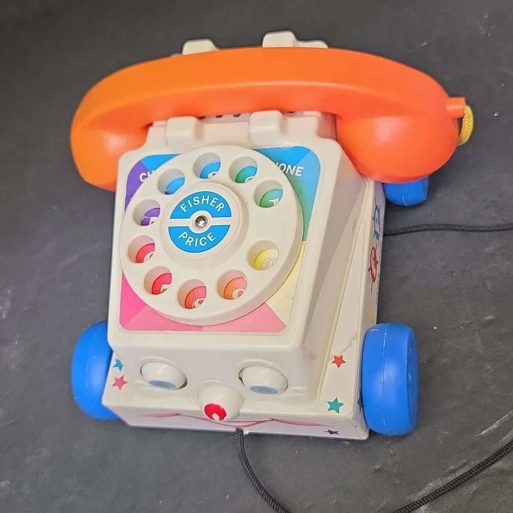 Vintage1979 Fisher-Price Roly Raccoon #172 Chatter Telephone, little Snoopy #693